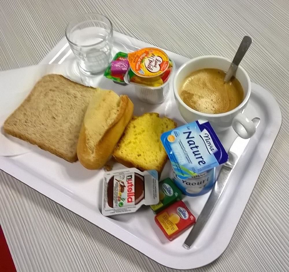 Premiere Classe Evreux Ngoại thất bức ảnh A typical breakfast in France